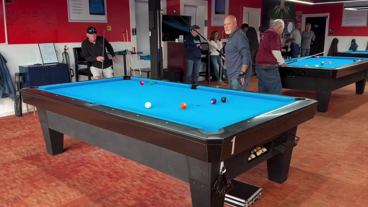 Academy members playing billiards together